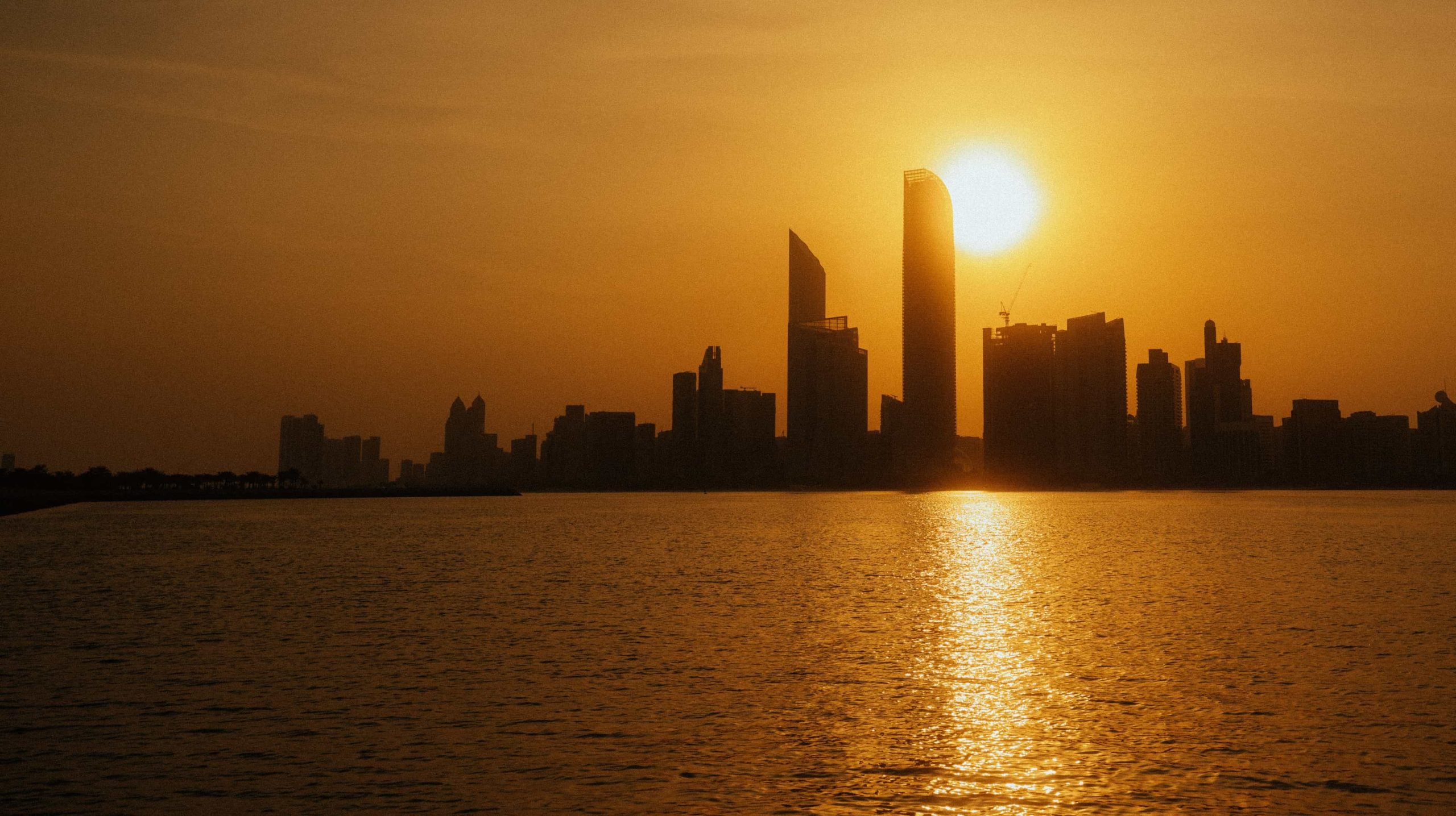 What is the hottest month in Abu Dhabi?